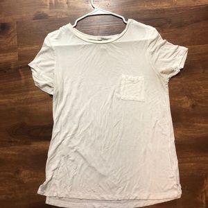 T-shift with pocket on upper left side